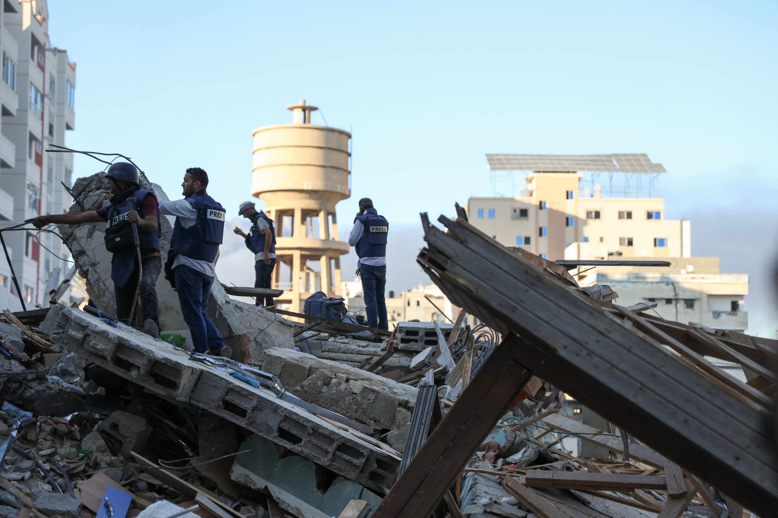 in-pictures-aftermath-of-israel-strike-on-gaza-building-used-by-media